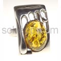 Amber ring with silver art nouveau setting