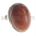 Ring with coral, oval