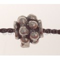 Auff�delperle mit Ornamenten