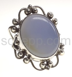 Ring, oval chalcedony with ornaments