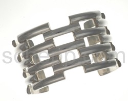 Bangle made of pieces of flat silver wire