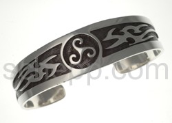 Bangle with triskele and Tribal ornaments