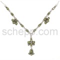 Collier with facet cut peridots
